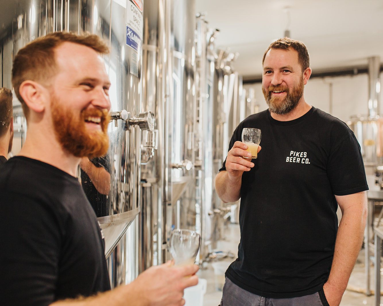 Alister Pike and Travis Campbell in the Pikes Brewery, hosting a tour